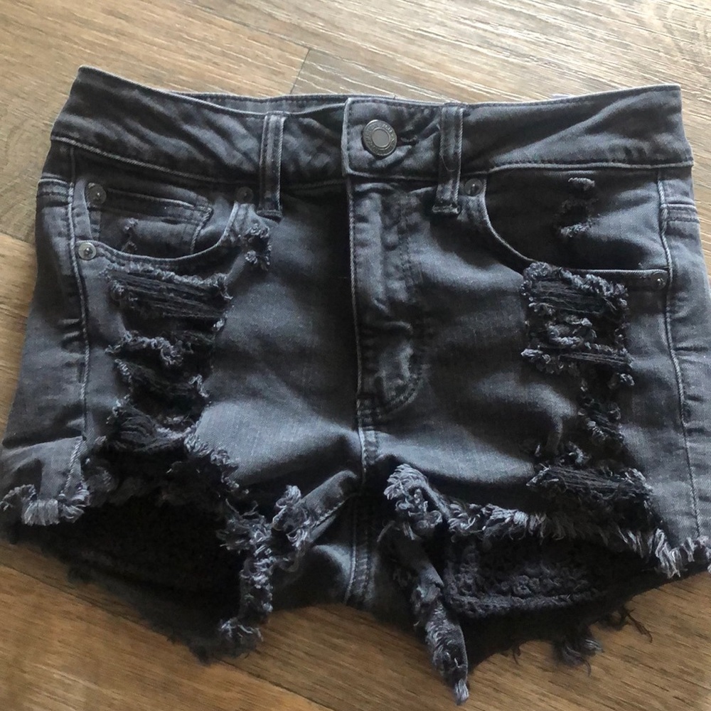 Black distressed American Eagle shorts